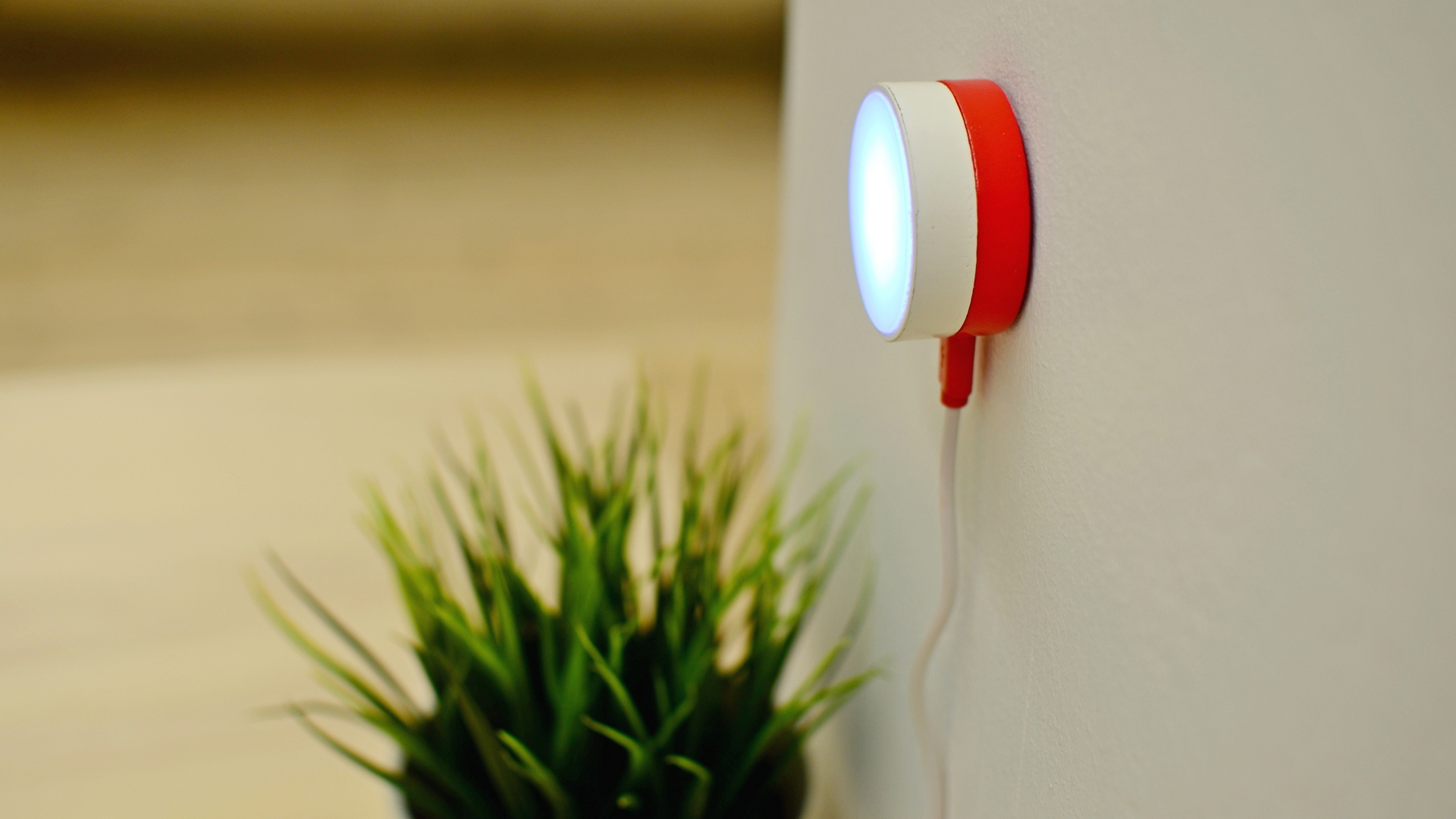 An image of metro light device, glowing on the wall.